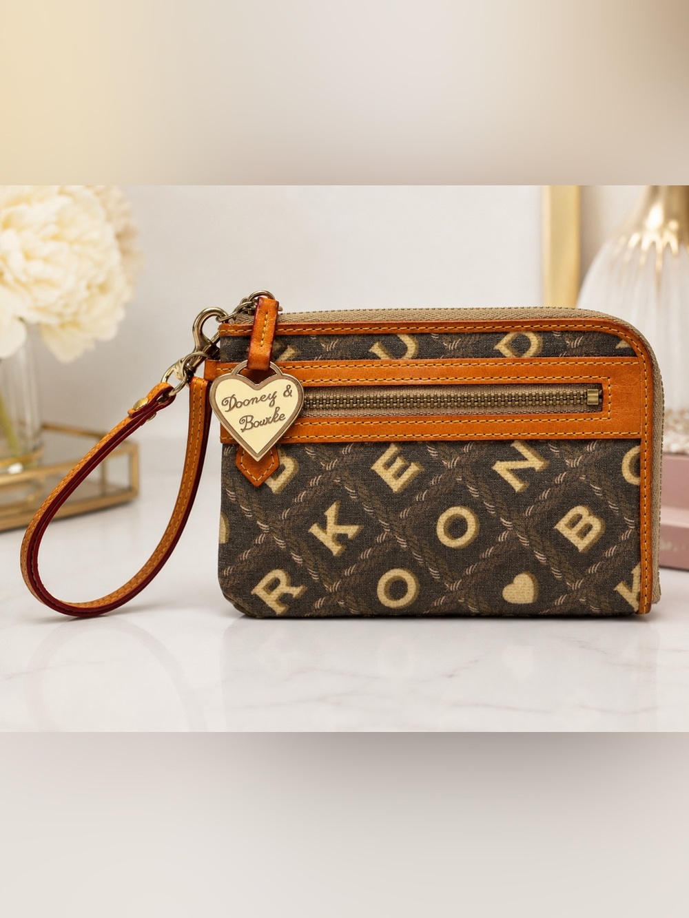 Dooney & Bourke Brown and Tan Logo Wristlet with Heart Charm